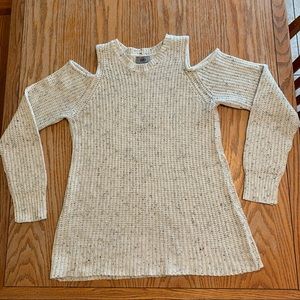 Light tan/beige with black flecks long sleeve cold shoulder sweater by Yaira.